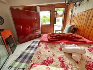 Cama ou camas em um quarto em Pousada Colibri Serrano