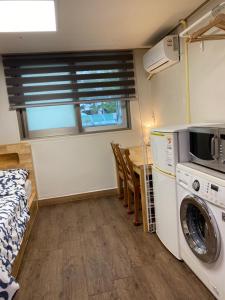 Kuchyň nebo kuchyňský kout v ubytování DWeo