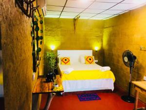 Postel nebo postele na pokoji v ubytování Nature lovers Safari Cottage + 105 fotografií