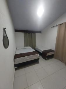 Fotografie z fotogalerie ubytování Quarto em Guarapari a 5 min da praia de Peracanga e Bacutia - Litoral Sul v destinaci Guarapari