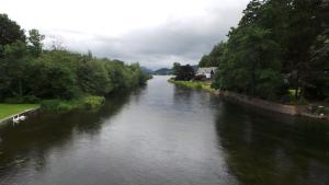 a view of a river from a bridge at Tynedale Guest House in Penrith +5 photos