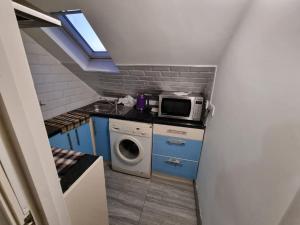 Η κουζίνα ή μικρή κουζίνα στο Studio flat, Heathrow, Free parking, Netflix +2 φωτογραφίες