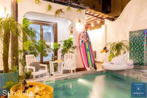 Bazén v ubytování Sun Villa Resort Mini - Trệt Không Lầu - Full Giải Trí nebo v jeho okolí