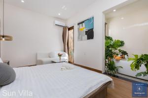 Postel nebo postele na pokoji v ubytování Sun Villa Resort Mini - Trệt Không Lầu - Full Giải Trí