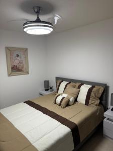 a bedroom with a large bed in a room at Jardines in San Miguel de Allende
