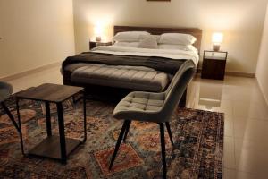 Ένα ή περισσότερα κρεβάτια σε δωμάτιο στο New Luxury Three Room Appartment +26 φωτογραφίες