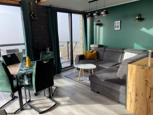 Posezení v ubytování Samsara Domek koło Międzygórza Z sauną i klimatyzacją