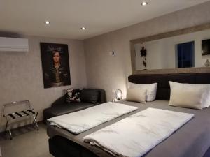 Ein Bett oder Betten in einem Zimmer der Unterkunft Gästehaus Sonja