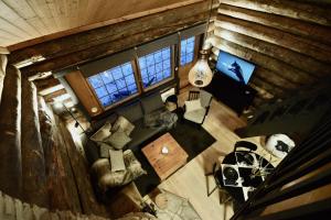 Μια τηλεόραση ή/και κέντρο ψυχαγωγίας στο Cosy cottage with 2 Skipasses at Levi
