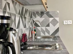 a kitchen with a sink and a counter top at The Central Retreat 2 in Mytilene