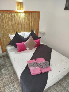 Postel nebo postele na pokoji v ubytování Riad Bab Lakhmiss