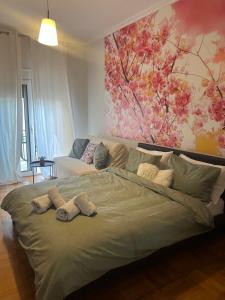 Posteľ alebo postele v izbe v ubytovaní Acropolis Urban Flat