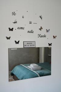 Postel nebo postele na pokoji v ubytování Angel Home
