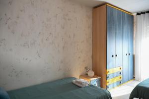 Postel nebo postele na pokoji v ubytování Angel Home