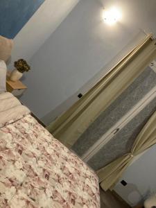 Postel nebo postele na pokoji v ubytování Poggio del Poeta