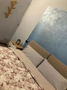 Postel nebo postele na pokoji v ubytování Poggio del Poeta