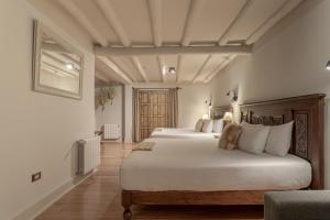 Postel nebo postele na pokoji v ubytování Antigua Casona San Blas