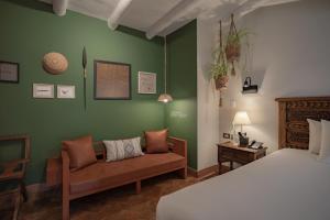 Postel nebo postele na pokoji v ubytování Antigua Casona San Blas