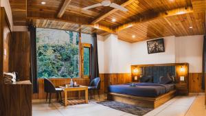 Postel nebo postele na pokoji v ubytování Odin Hostel Kasol