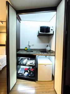 Køkken eller tekøkken på Apartamento Pátio Paulista