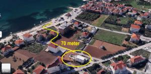 a map of a house with a yellow circle at Villa Trogir in Trogir