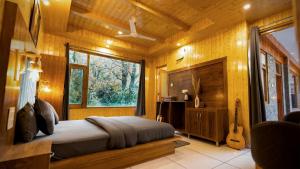 Postel nebo postele na pokoji v ubytování Odin Hostel Kasol