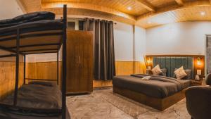 Postel nebo postele na pokoji v ubytování Odin Hostel Kasol