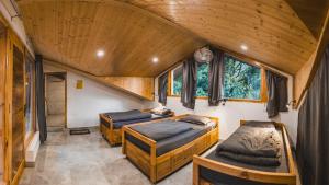 Postel nebo postele na pokoji v ubytování Odin Hostel Kasol
