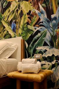 Eterna Suites Roma客房内的一张或多张床位