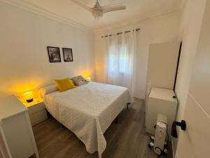 Ένα ή περισσότερα κρεβάτια σε δωμάτιο στο Apartamento Familiar Parque Alonso Sánchez