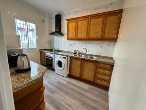 Η κουζίνα ή μικρή κουζίνα στο Apartamento Familiar Parque Alonso Sánchez