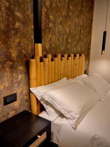 Eterna Suites Roma客房内的一张或多张床位