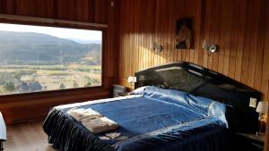 Postel nebo postele na pokoji v ubytování Vistas a las Montañas