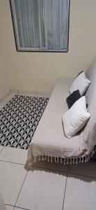 En eller flere senge i et værelse på Lar da praia