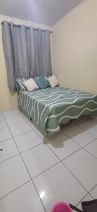 En eller flere senge i et værelse på Lar da praia