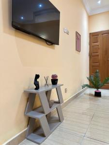 TV i/ili multimedijalni sistem u objektu Maison scandinave