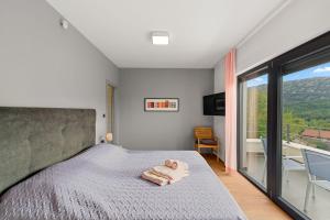 Ένα ή περισσότερα κρεβάτια σε δωμάτιο στο Villa Adria blue +78 φωτογραφίες