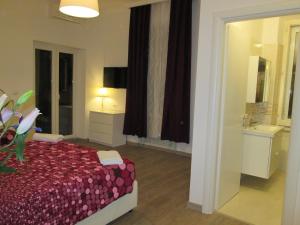Postel nebo postele na pokoji v ubytování Trevi Elegance Suite