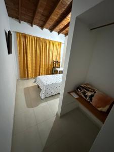 Letto o letti in una camera di Casa Lisieux- Jericó