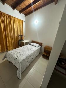 Letto o letti in una camera di Casa Lisieux- Jericó