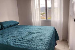 Postel nebo postele na pokoji v ubytování Apartamento con Piscina