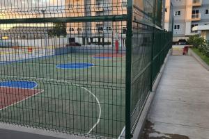Tenis a/nebo squash v ubytování Apartamento con Piscina nebo okolí