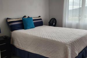 Postel nebo postele na pokoji v ubytování Apartamento con Piscina