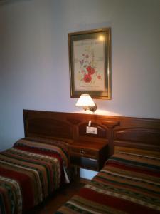 Postel nebo postele na pokoji v ubytování Hostal Rural Poqueira
