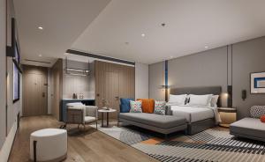 Ein Sitzbereich in der Unterkunft Holiday Inn Express Zhengzhou Nongye Road by IHG