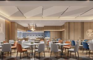 Ein Sitzbereich in der Unterkunft Holiday Inn Express Zhengzhou Nongye Road by IHG