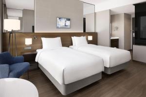 Postelja oz. postelje v sobi nastanitve Four Points by Sheraton Suwon