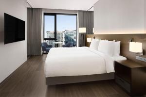 Postelja oz. postelje v sobi nastanitve Four Points by Sheraton Suwon
