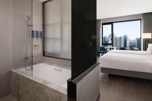 Postelja oz. postelje v sobi nastanitve Four Points by Sheraton Suwon