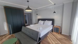 Postel nebo postele na pokoji v ubytování Hotel Luciano